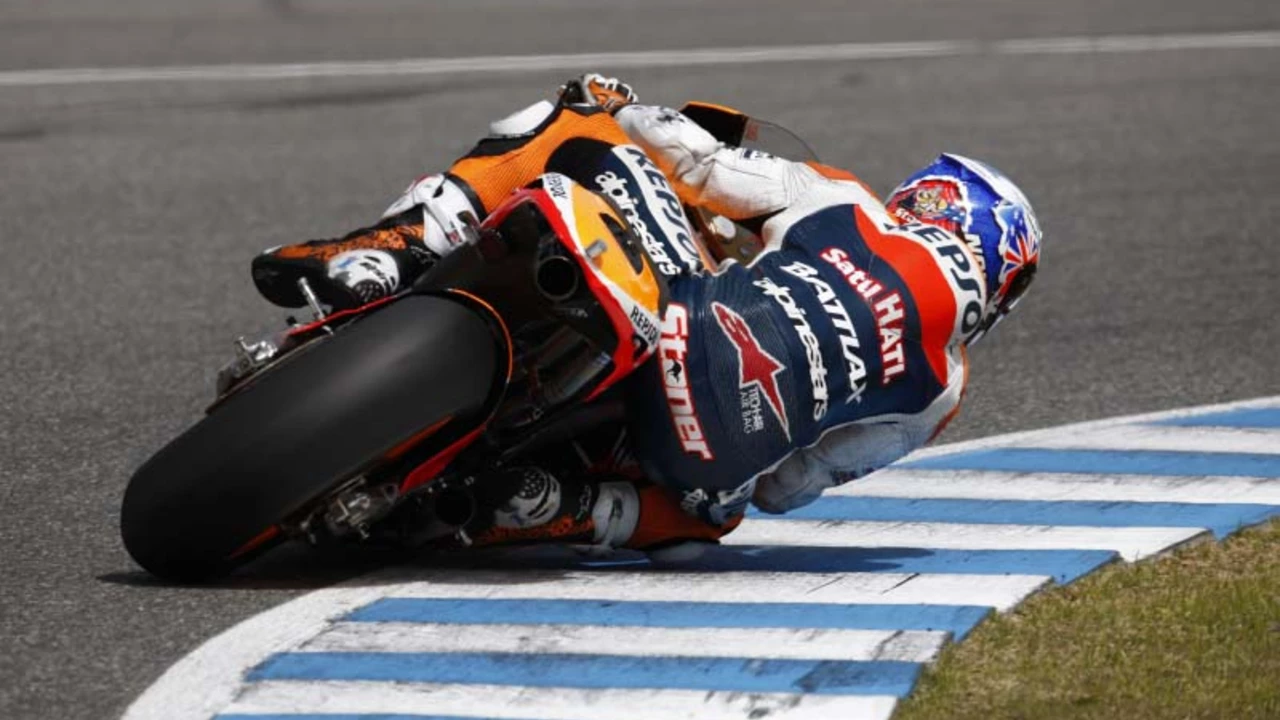 Why do motorcycle racers drag their knees?